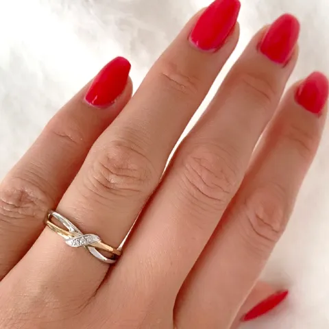 diamantring i 14 karat guld.- og hvidguld 0,03 ct