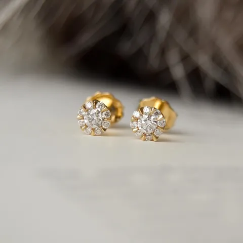 runde diamant ørestikker i 14 karat guld med diamant og diamant