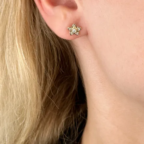 blomster diamant ørestikker i 14 karat guld med diamant