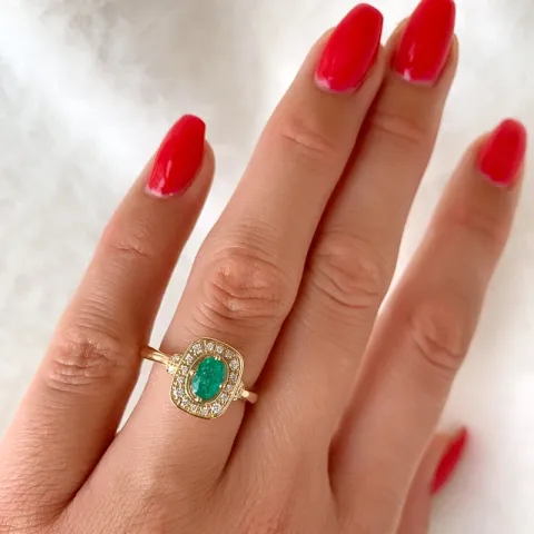 firkantet smaragd diamantring i 14 karat guld 0.47 ct 0.152 ct
