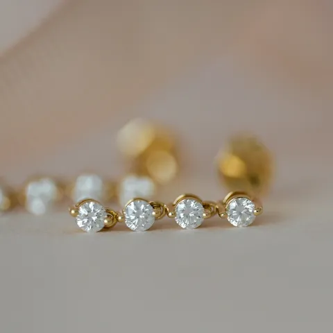 diamant ørestikker i 14 karat guld med diamant