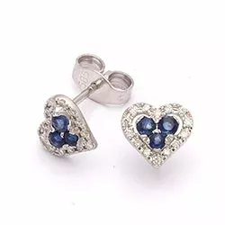 Hjerte øreringe i 14 karat hvidguld med diamanter og safirer 