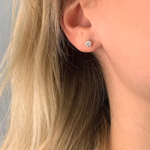 zirkon solitaireørestikker i sølv