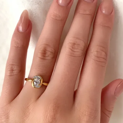 oval hvid zirkon ring i 9 karat guld med rhodium