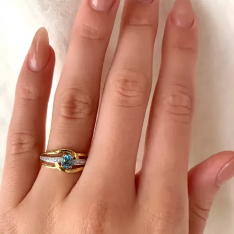 Glat blå topas ring i 9 karat guld med rhodium