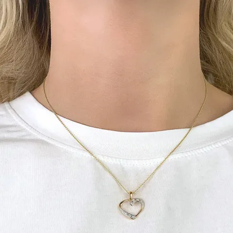 hjerte vedhæng i 9 karat guld med rhodium