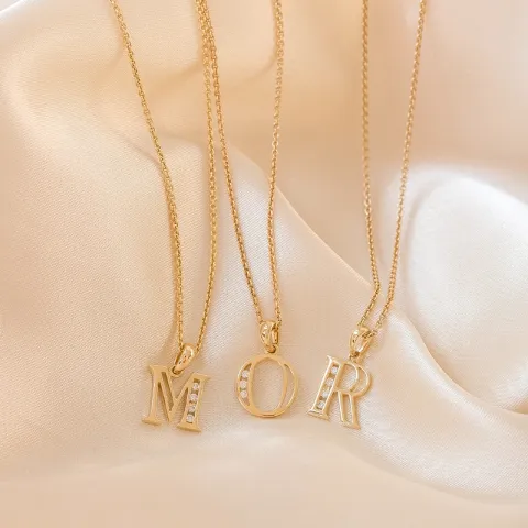 bogstav R vedhæng i 14 karat guld 0,04 ct