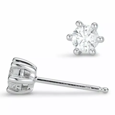2 x 0,25 ct diamant solitaireørestikker i 14 karat hvidguld med diamant