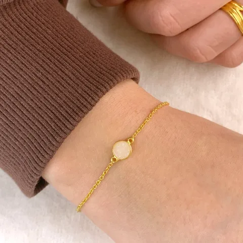 armbånd i forgyldt sølv med vedhæng i forgyldt sølv