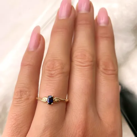 blå safir diamantring i 14 karat guld 0,008 ct 