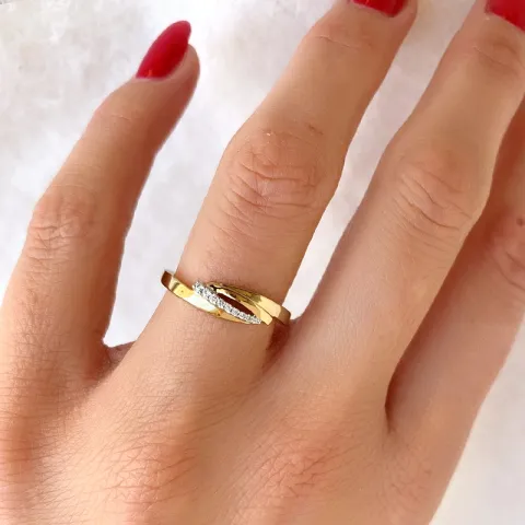 abstrakt diamantring i 14 karat guld.- og hvidguld 0,038 ct