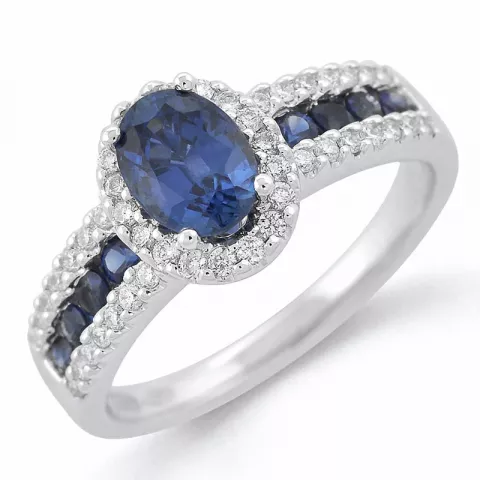oval blå safir diamantring i 14 karat hvidguld 0,286 ct 