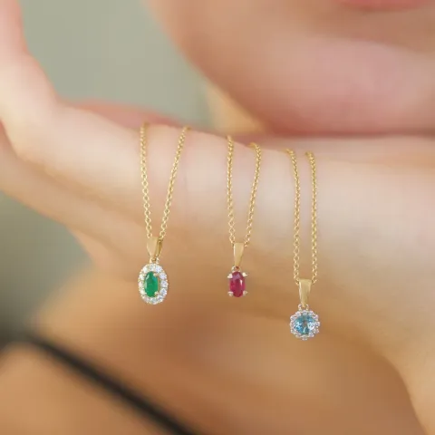 ovalt smaragd diamantvedhæng i 14 karat guld 0,25 ct 0,15 ct