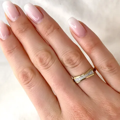 abstrakt diamant ring i 9 karat guld.- og hvidguld 0,02 ct
