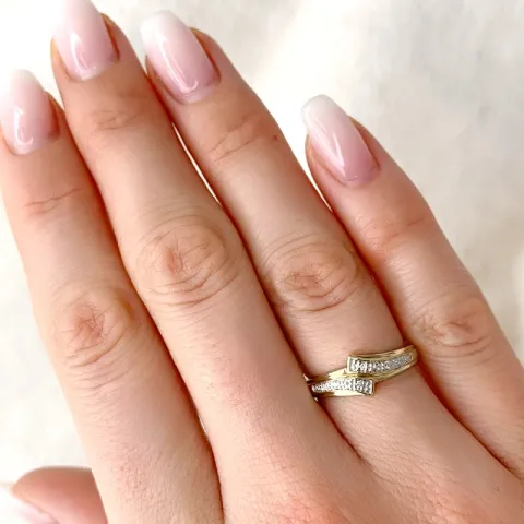 abstrakt diamant ring i 9 karat guld.- og hvidguld 0,02 ct