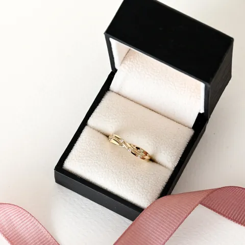 abstrakt diamant ring i 9 karat guld 0,03 ct