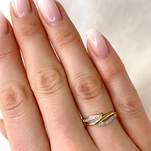 abstrakt diamant ring i 9 karat guld.- og hvidguld 0,04 ct