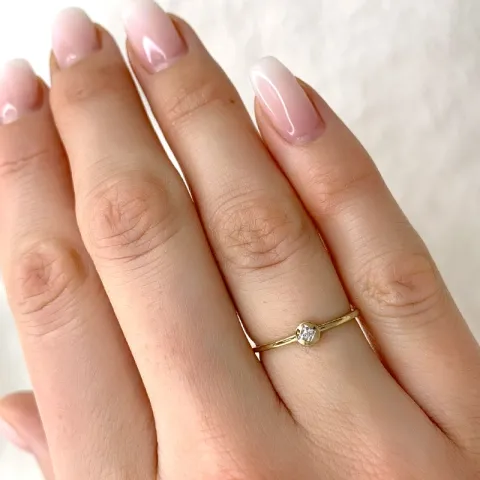 rund diamantring i 9 karat guld.- og hvidguld 0,01 ct
