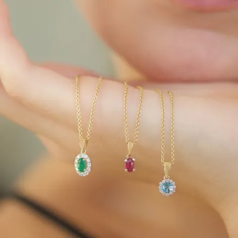 Elegant rundt topas diamantvedhæng i 9 karat guld 0,07 ct 0,30 ct