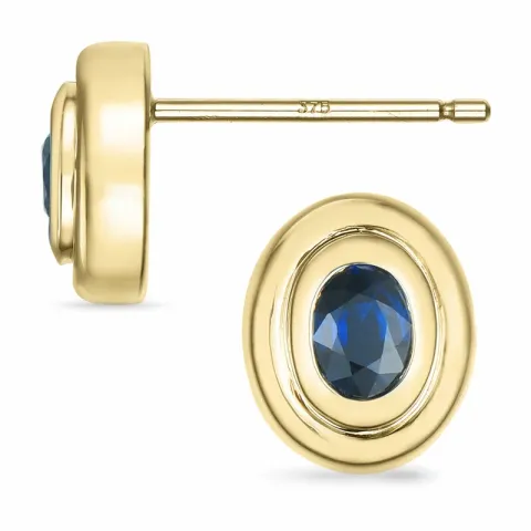 ovale safir solitaireørestikker i 9 karat guld med safir