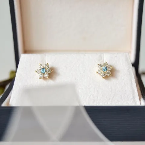 blomster topas diamantøreringe i 9 karat guld med diamant og topas