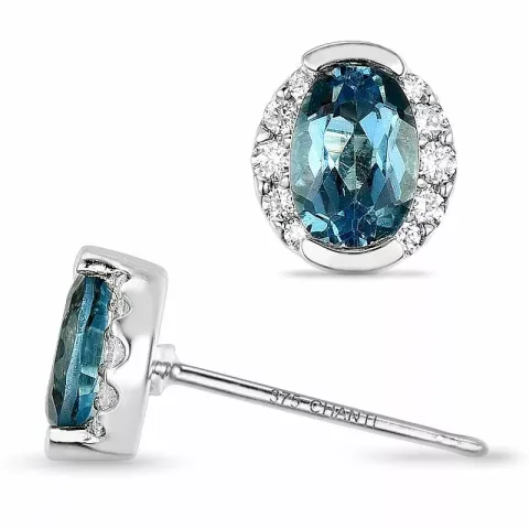 ovale topas diamantøreringe i 9 karat hvidguld med diamant og topas
