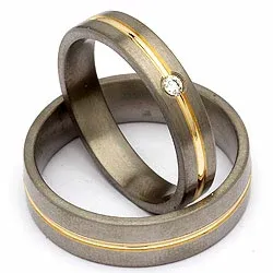 Vielsesringe i titanium og alm. guld 0,04 ct