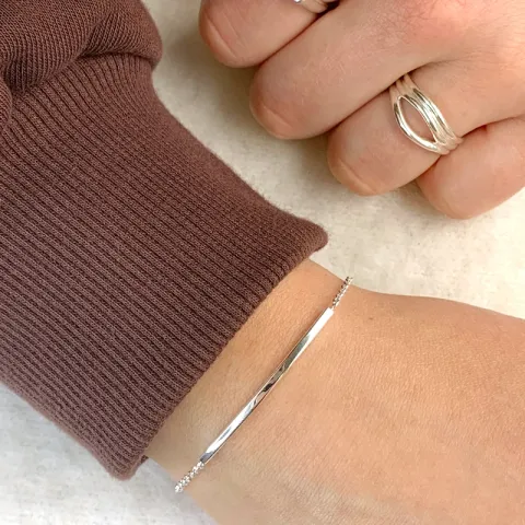 armbånd i sølv med vedhæng i sølv