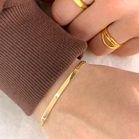 armbånd i forgyldt sølv med vedhæng i forgyldt sølv