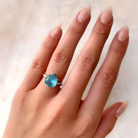 Oval blå ring i sølv