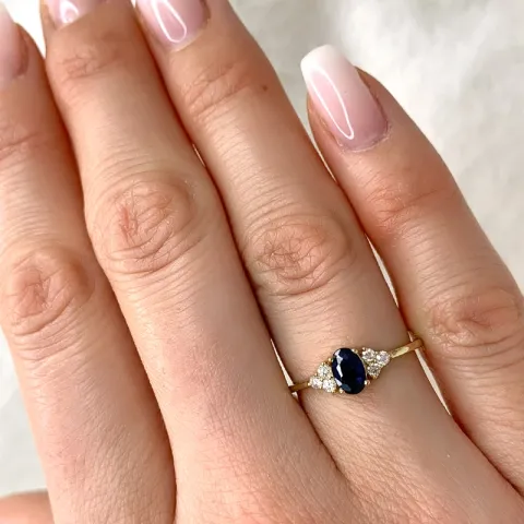 blå safir diamantring i 14 karat guld 0,57 ct 0,13 ct