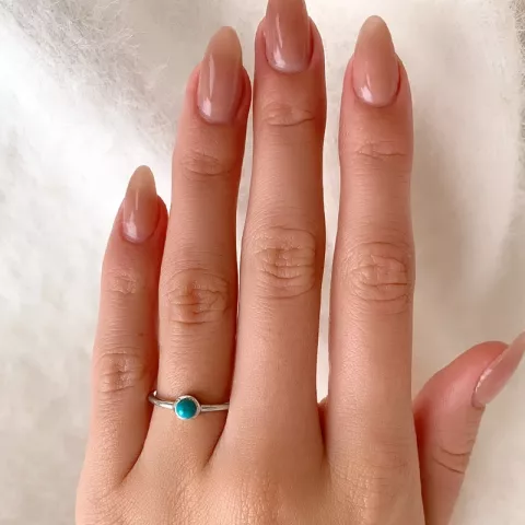 Rund blå ring i sølv