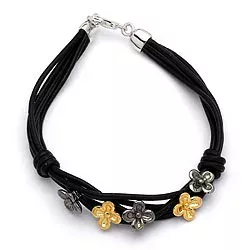sort armbånd i læder med blomstervedhæng i Forgyldt og rhodineret sølv
