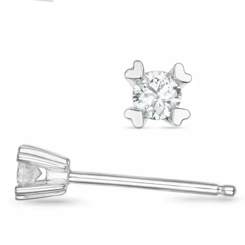2 x 0,05 ct solitaireørestikker i 14 karat hvidguld med diamant