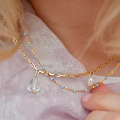 Enamel Lola Sky halskæde i forgyldt sølv lyseblå emalje