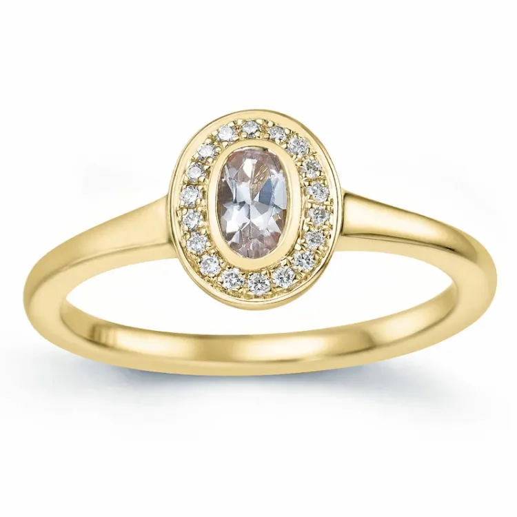 oval morganit brillantring i 14 karat guld 0,18 ct 0,072 ct