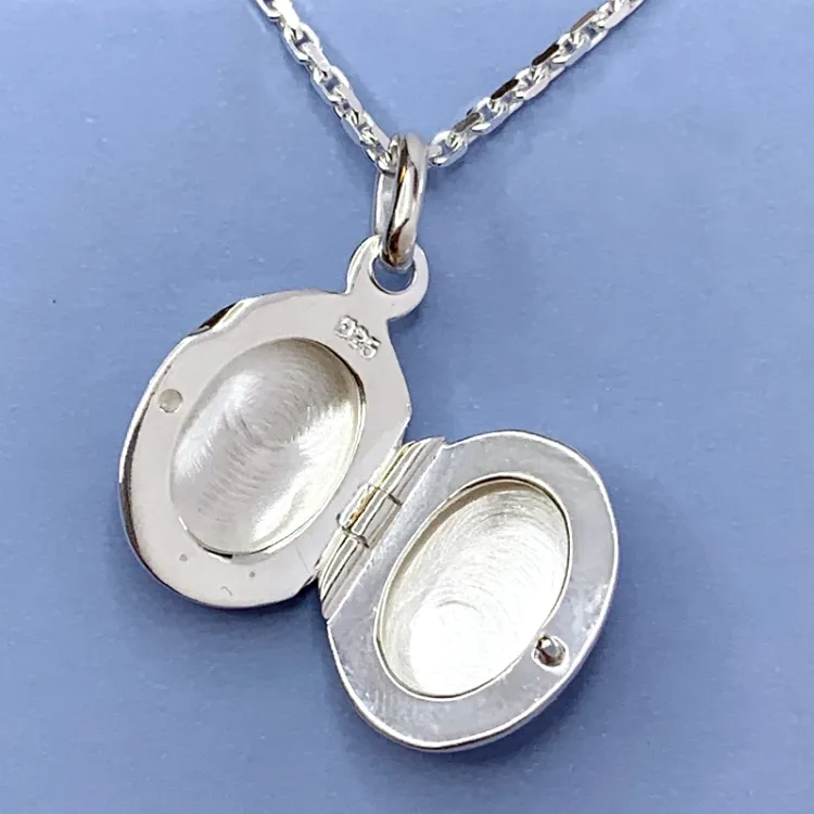 12 x 15 mm ovalt medaljon i sølv