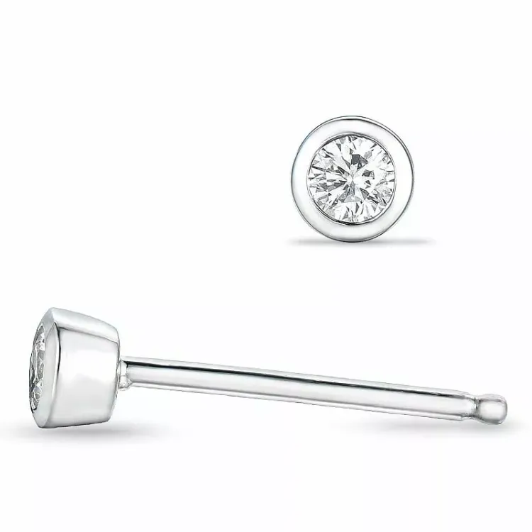 2 x 0,05 ct diamant solitaireørestikker i 14 karat hvidguld med diamant