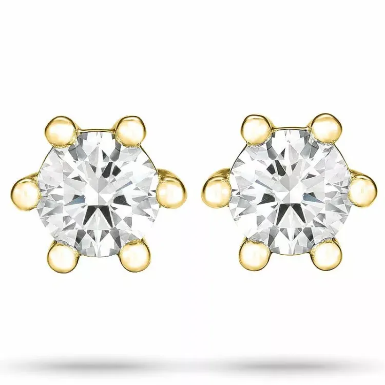 2 x 0,15 ct  solitaireørestikker i 14 karat guld med diamant 