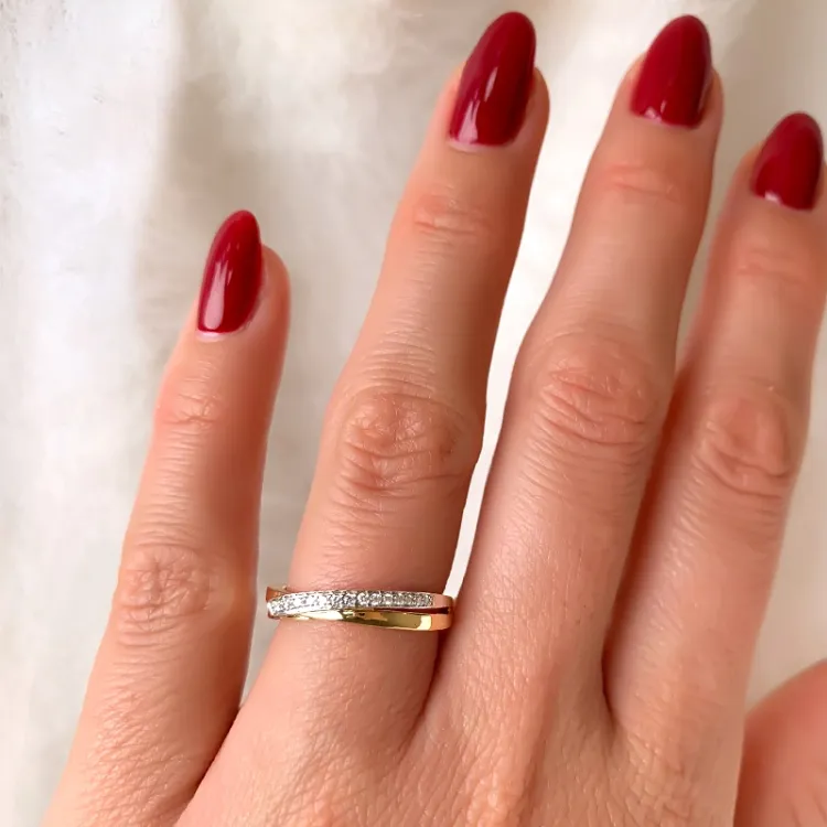 Brillantring i 14 karat guld.- og hvidguld 0,083 ct