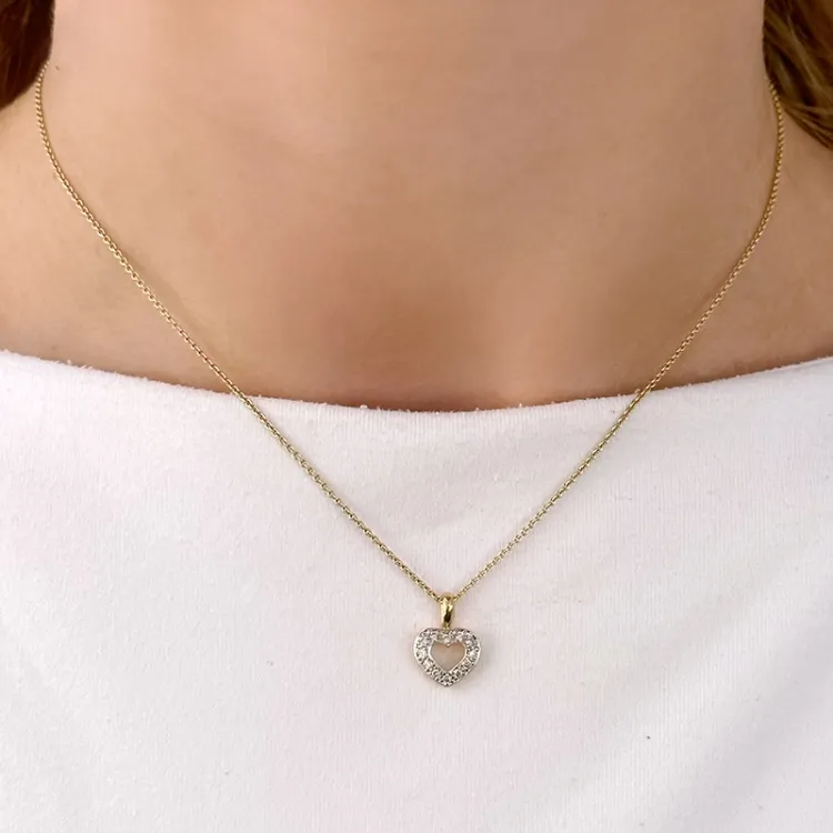 hjerte diamant vedhæng i 14 karat guld.- og hvidguld 0,15 ct