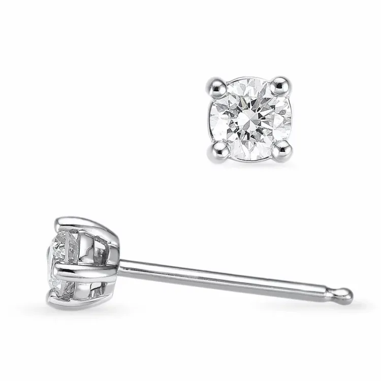 2 x 0,13 ct solitaireørestikker i 14 karat hvidguld med diamant