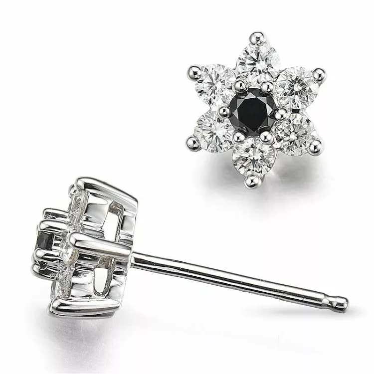 blomster diamant ørestikker i 14 karat hvidguld med diamant og sort diamant
