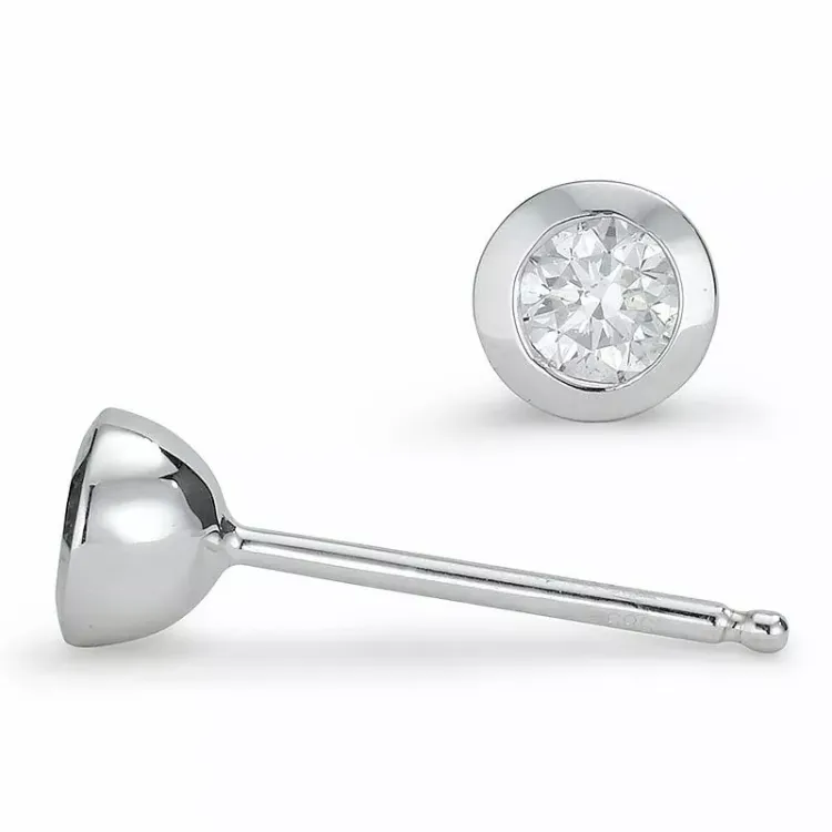 2 x 0,15 ct diamant solitaireørestikker i 14 karat hvidguld med diamant