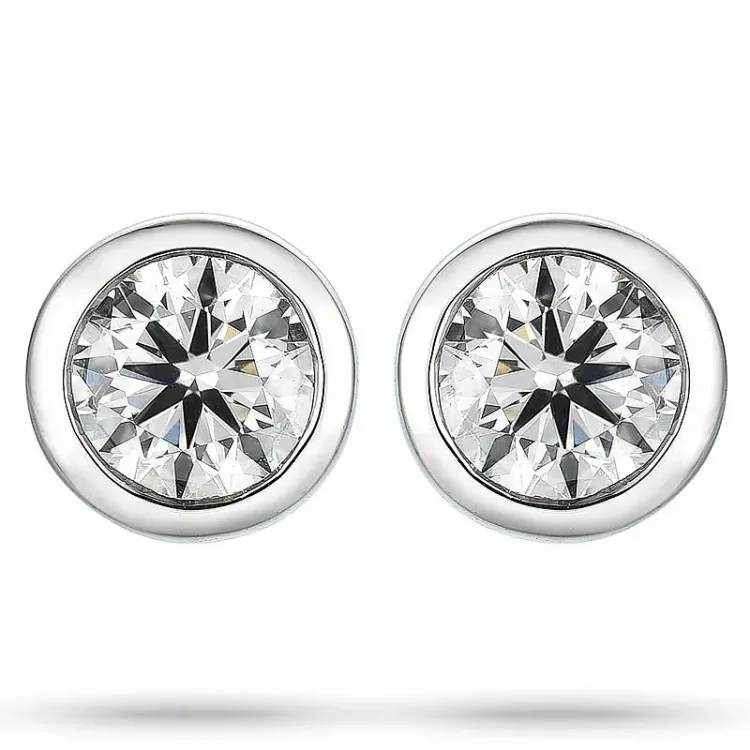 2 x 0,25 ct solitaireørestikker i 14 karat guld med diamant 