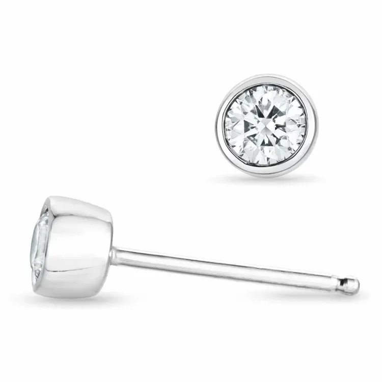 2 x 0,15 ct hvidguld solitaireørestikker i 14 karat hvidguld med diamant