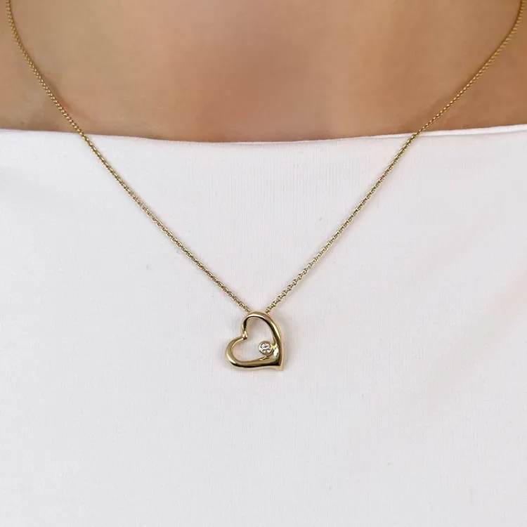 ægte hjerte diamantvedhæng i 14 karat guld 0,03 ct