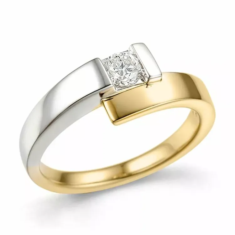 abstrakt diamant ring i 14 karat guld.- og hvidguld 0,26 ct