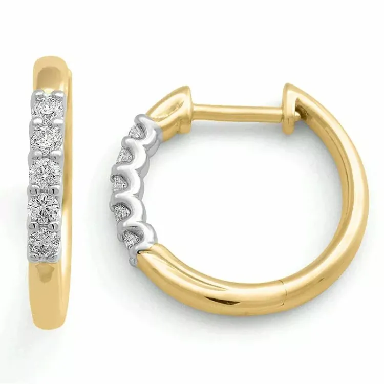 16 mm creoler i 14 karat guld og hvidguld med diamant
