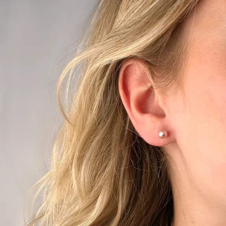 5,5 mm rosa perleøreringe i 9 karat guld